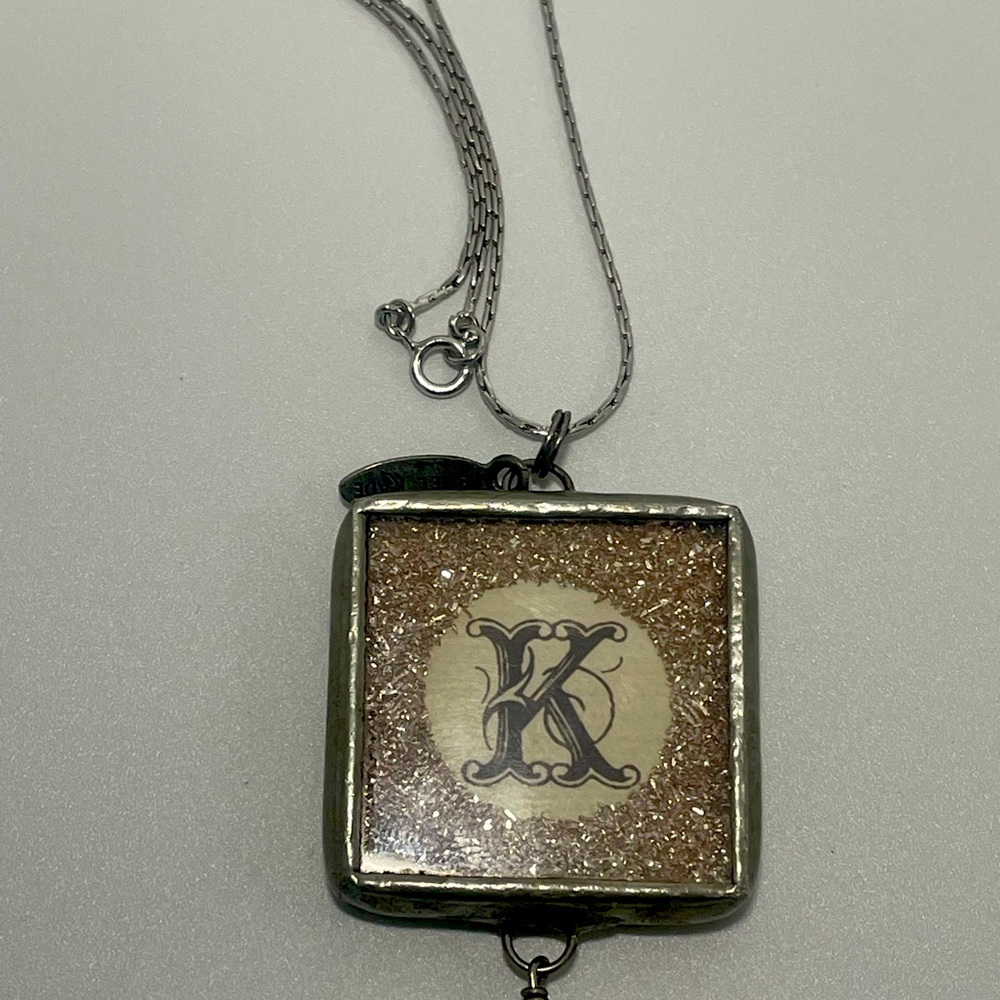 Monogram necklace.
